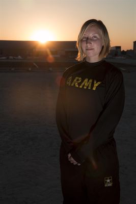 Taekwondo Pro California Army National Guard Sgt. Cassandra Peel, an avionics mechanic in Bravo Company, 640th Aviation Support Battalion, 40th Combat Aviation Brigade, takes a break from taekwondo practice at Camp Buehring, Kuwait, April 2, 2016. Army photo by Staff Sgt. Ian Kummer